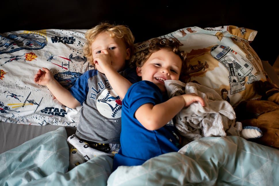 brothers having a nap during family photoshoot st albans