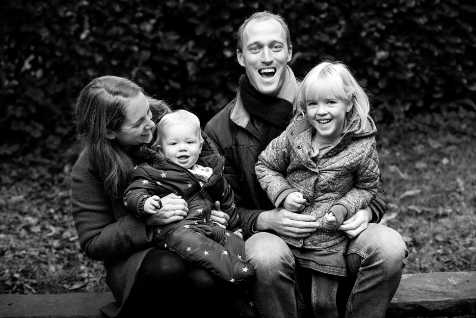happy family laughing during st albans family photo session