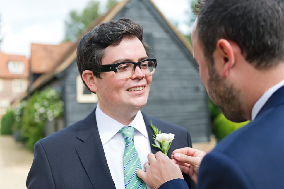 St Albans groom puts on buttonhole