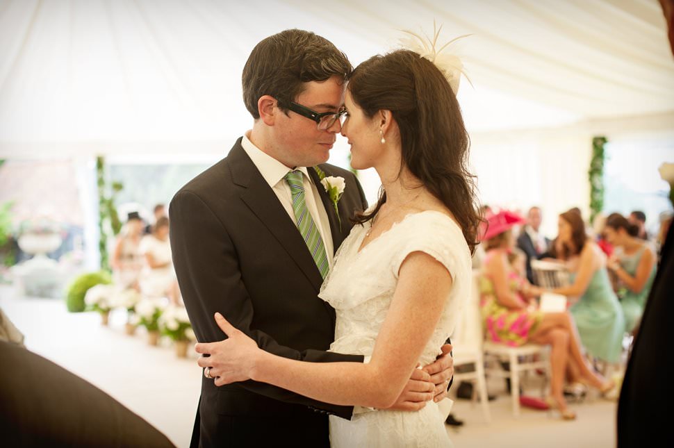 tender moment during Hertfordshire marquee wedding