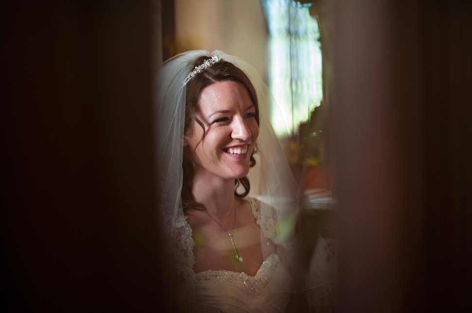 smiling bride at church wedding