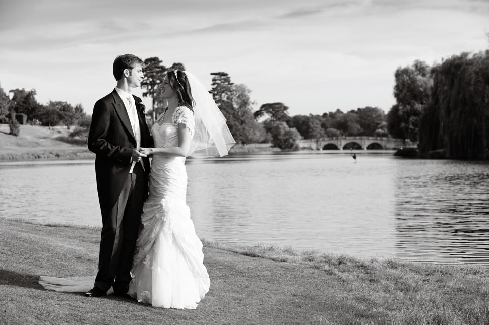 bride and groom by brocket hall lake