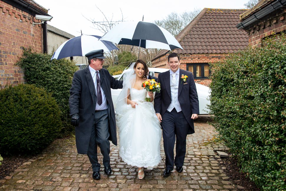 rainy day for bride in wedding car going to Coltsfoot Country Retreat wedding