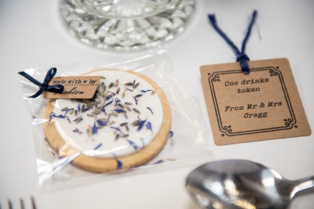 Homemade biscuit and drink token wedding favour
