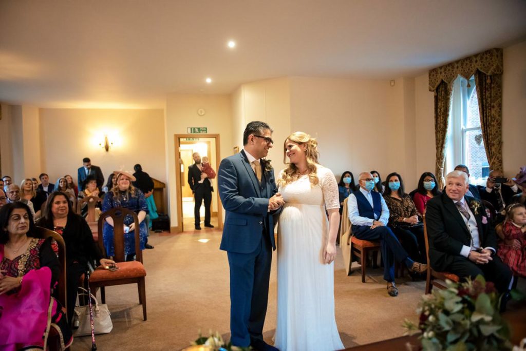 A wide shot of the St Albans Registry Office during a winter wedding ceremony.