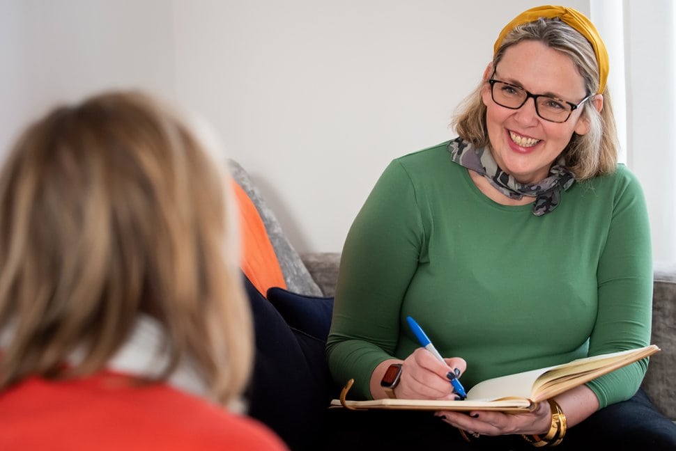 Coach working with client during personal branding shoot