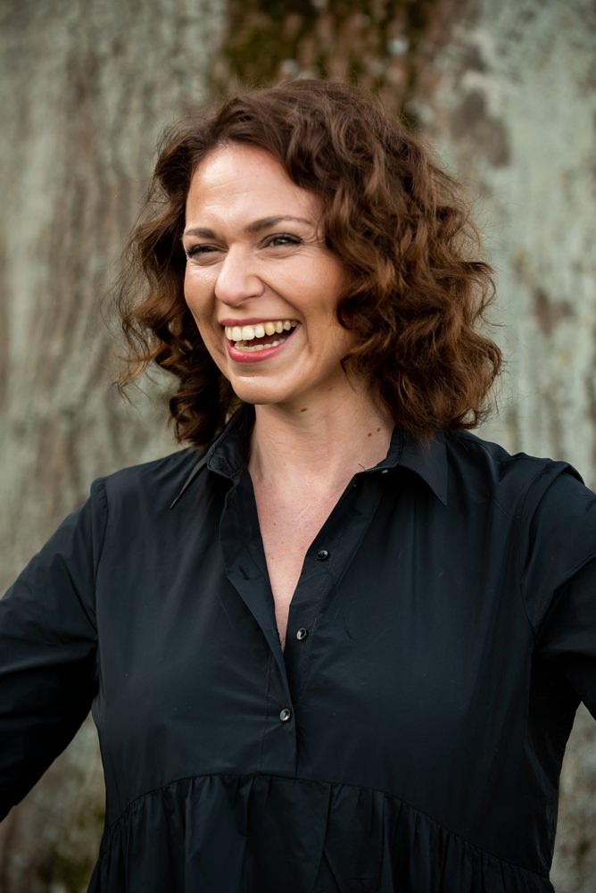 laughing female business owner headshot during personal branding shoot