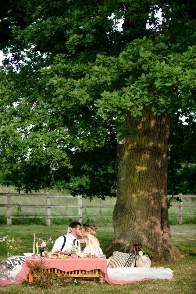 Bride and groom picnic at Milling Barn