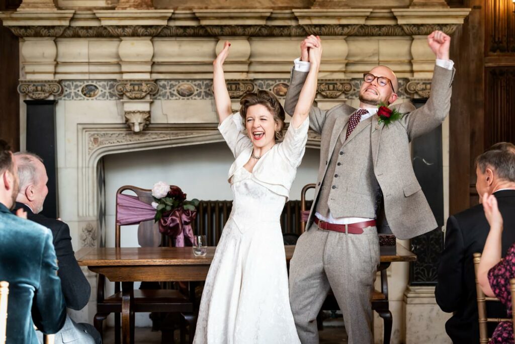 Bride and groom celebrate saying I Do at Rothamsted Manor