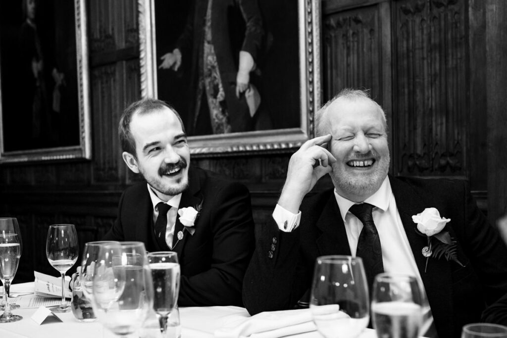 Father and best man laughing at Rothamsted Manor wedding