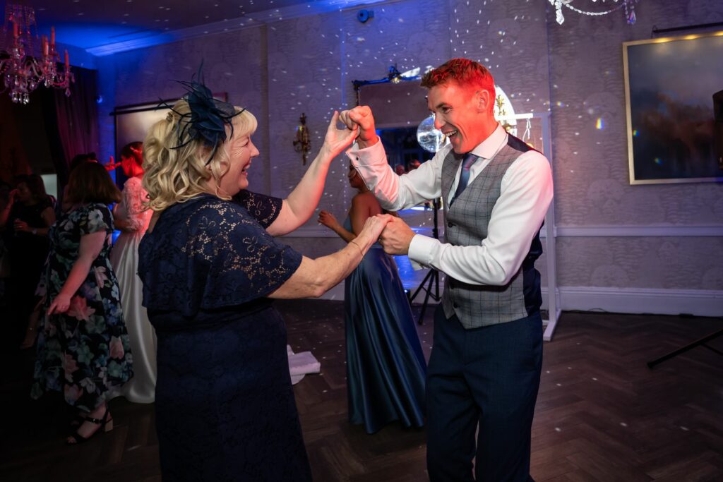 Groom dances with his mum at St Michaels Manor