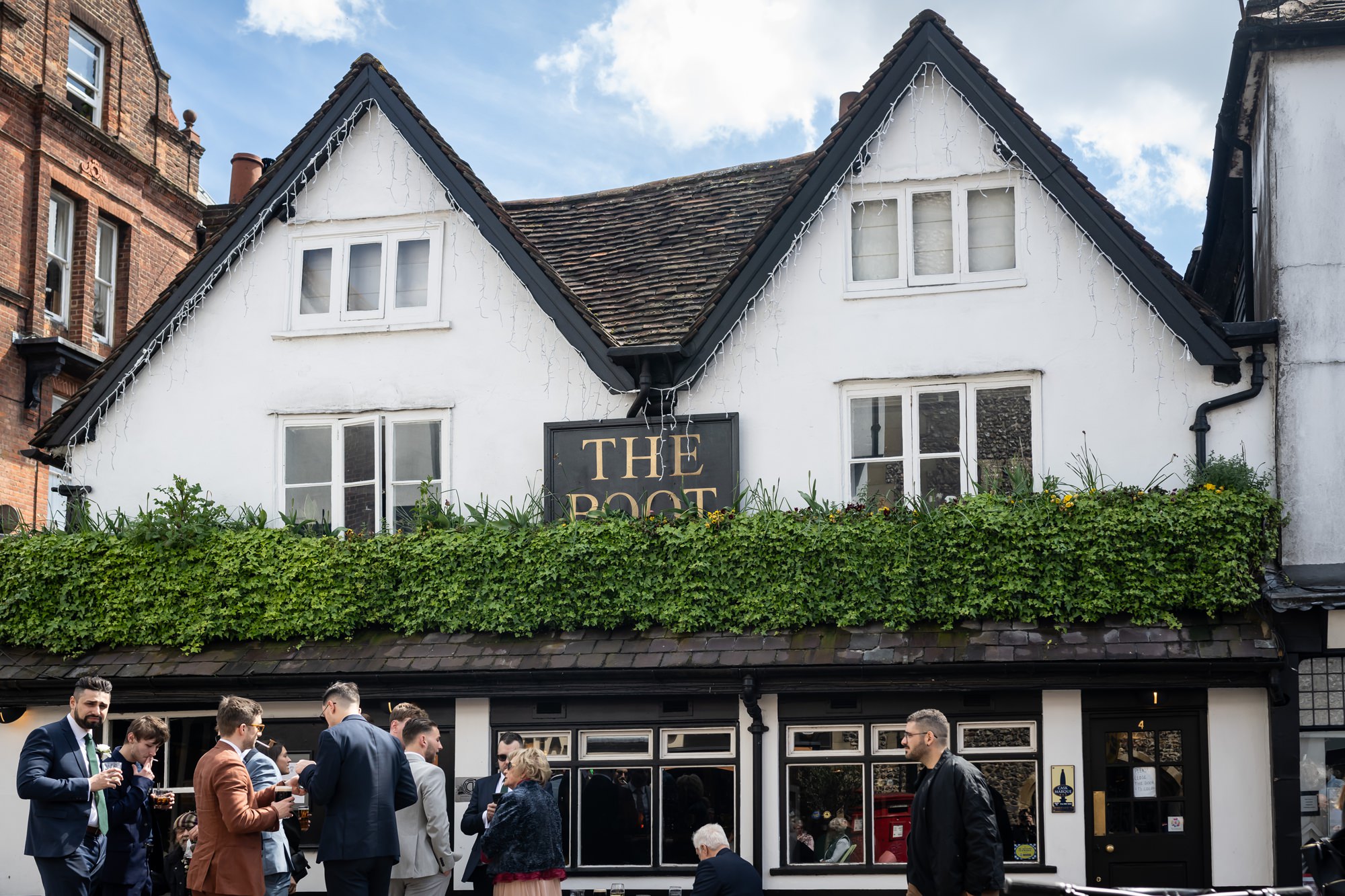 Wedding guests at the Boot in St Albans for pre ceremony drinks