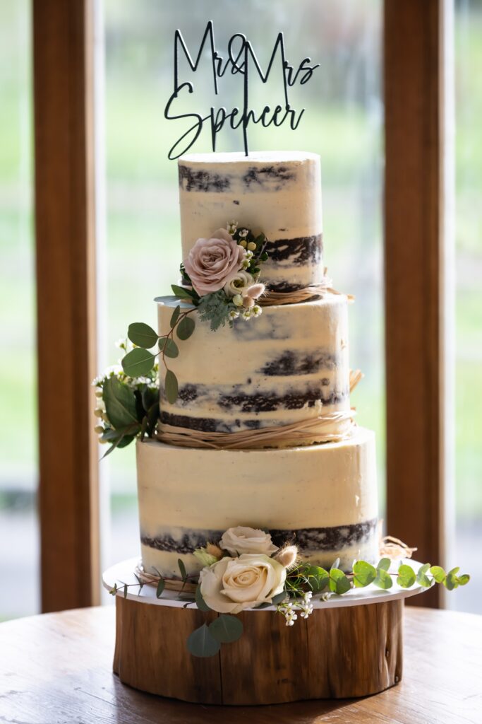 Naked wedding cake at Coltsfoot wedding venue Hertfordshire