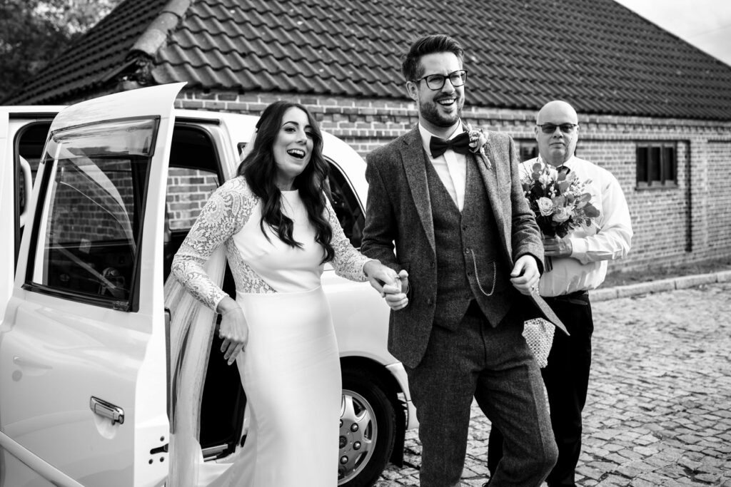 Bride and groom arrive at Coltsfoot wedding venue Hertfordshire