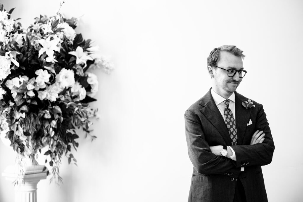 Groom waits patiently for arrival of bride at Hertford Register office
