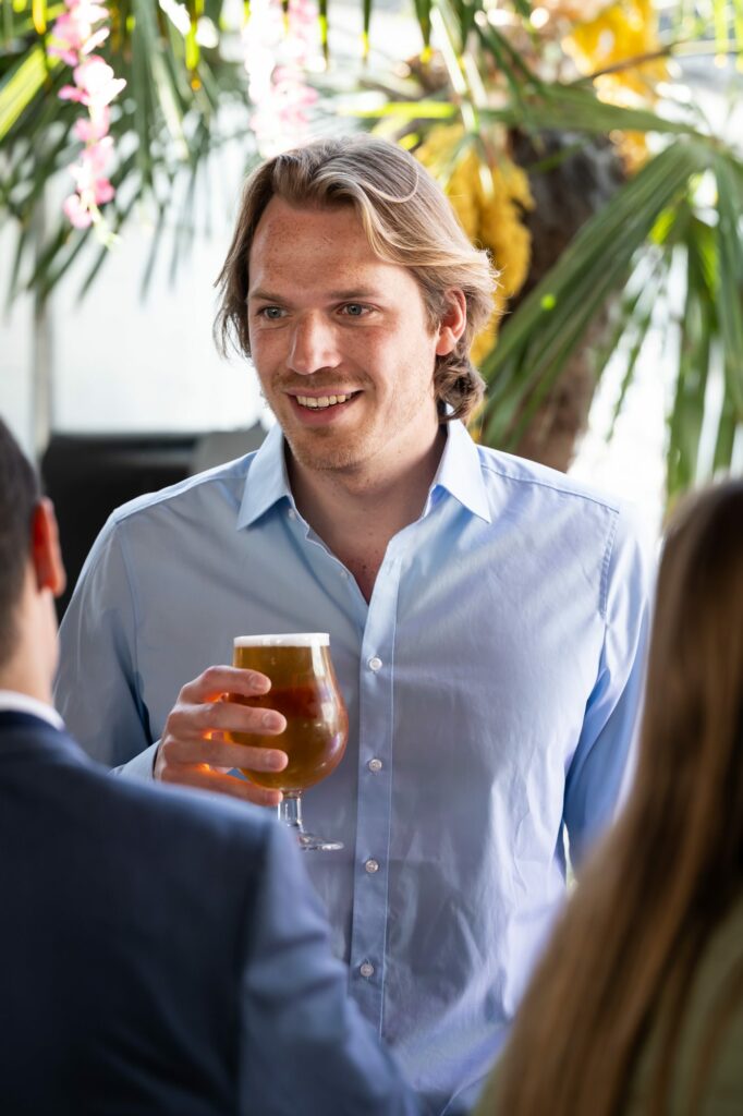 Happy wedding guest natural candid photos at pub wedding reception