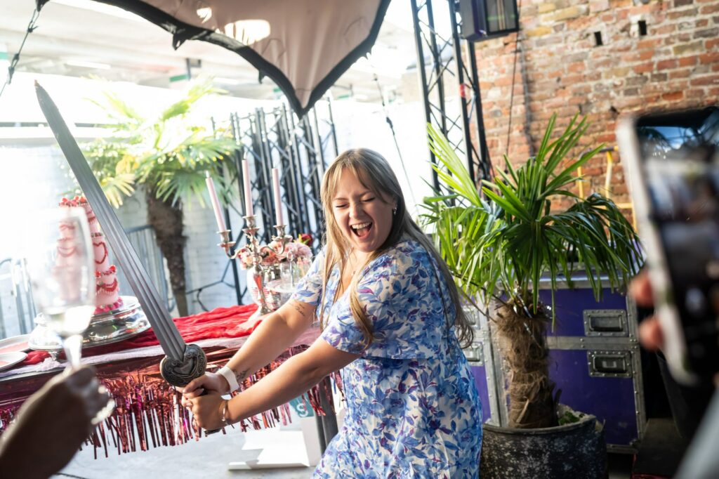Wedding guest having fun at relaxed pub wedding reception