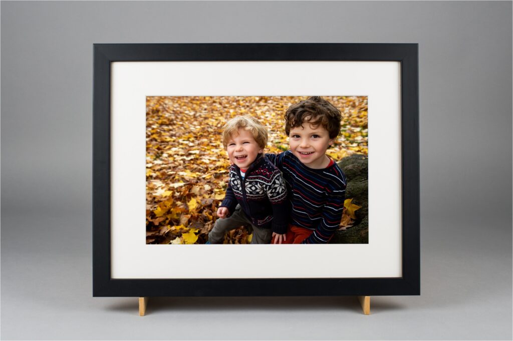 Happy kids laughing in desk frame