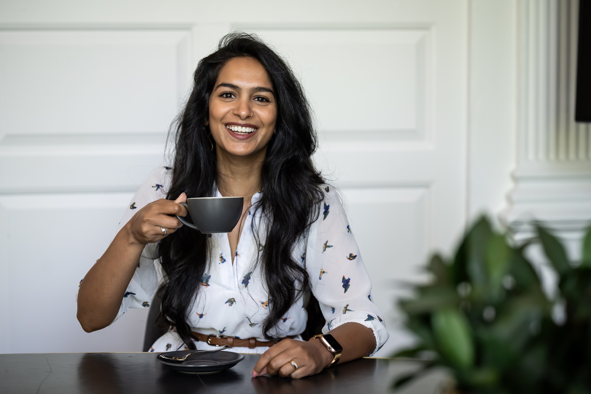 London business woman drinking coffee during branding shoot